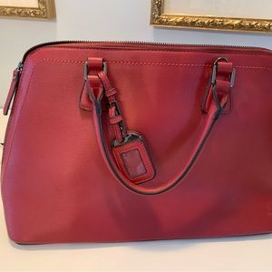 Browns red leather handbag.